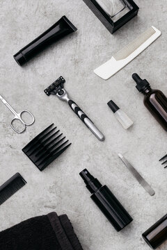 Set of various tools for haircuts shaving and men's grooming on table