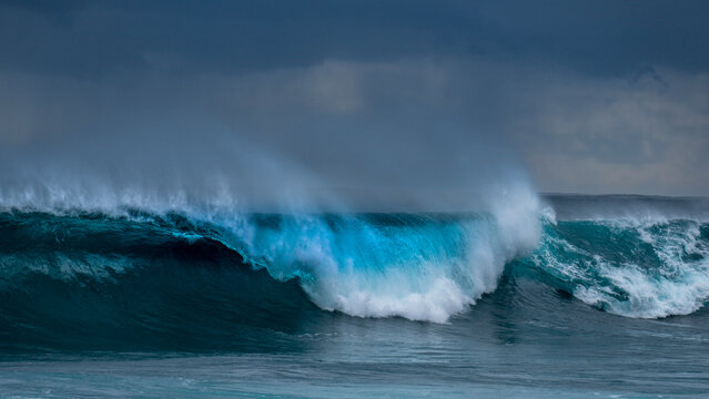 Perfect turquoise wave breaking