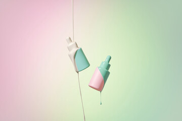 Milk falling on serum bottle on multicolor background