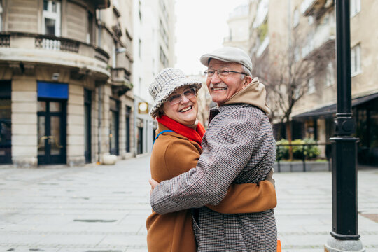 Senior Love Couple Hugging in City