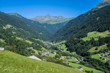 Fototapeta na wymiar Village of Sibertal toward Lobspitze in the Montafon Valley, State of Vorarlberg, Austria, Drone Photography