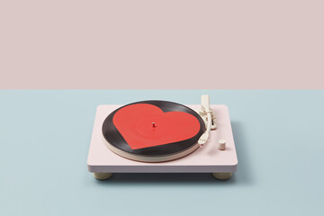 Trendy record player and vinyl with red heart.
