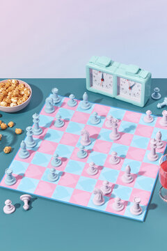 Chessboard with heart pattern and party snacks.