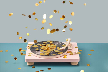 Pink vinyl player with golden confetti falling around.