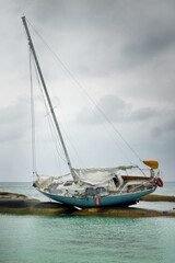 Sailboat sinking while grounded