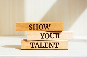 Wooden blocks with words 'Show your Talent'.