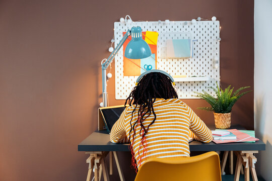 Young student doing homework.