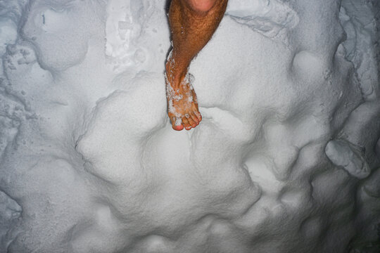 Bare Foot In Cold Winter Snow After Bathhouse