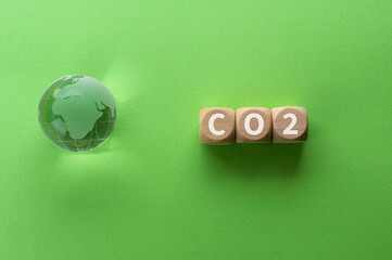 There is wood cubes with the word CO2. It is eye-catching image.