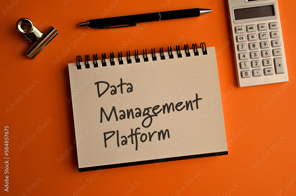 Poster there is a notebook with the word data management platform. it is eye-catching image.