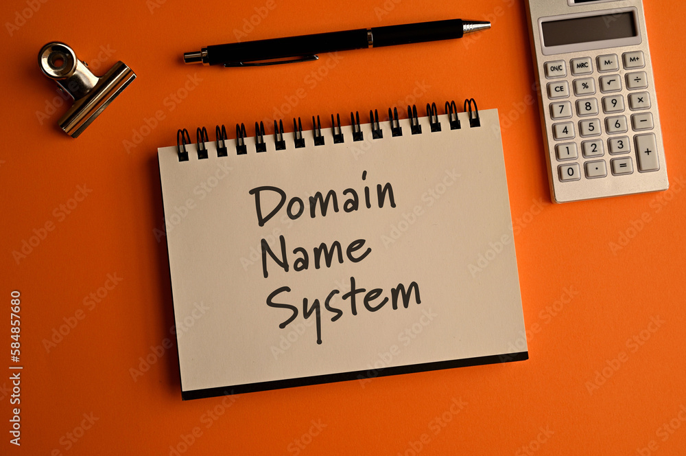 Poster there is a notebook with the word domain name system. it is eye-catching image.