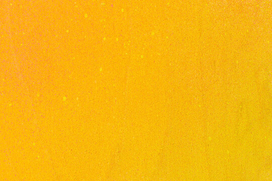 Yellow woodgrain spray painted background