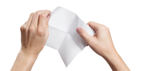 Hands folding or opening a sheet of white paper, cut out