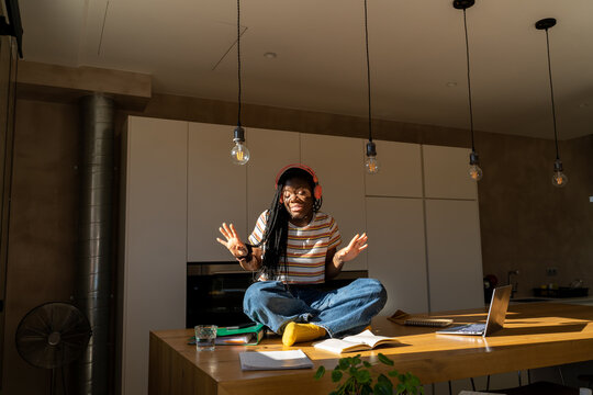 Teen dancing in the kitchen