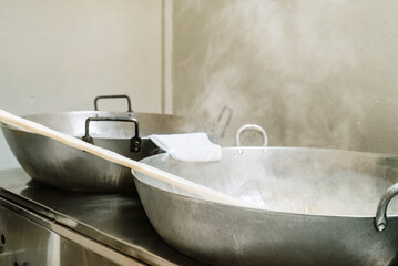 Hot pots with steam in work area