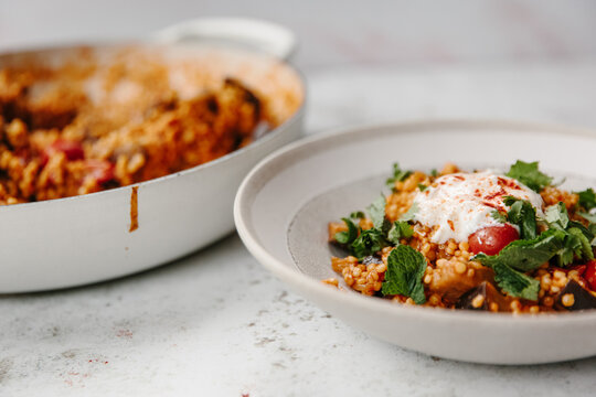 Pearl couscous with vegetables and paprika

