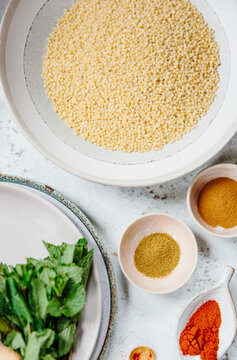 Ingredients for a dish of pearl couscous.