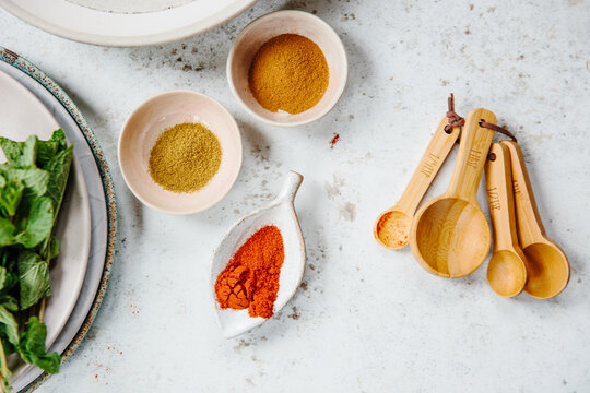 Ground spices and measuring spoon