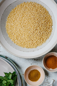 Ingredients for a dish of pearl couscous.
