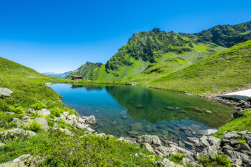 Plakat Lake in the Hochjoch, in the Montafon Valley, State of Vorarlberg.