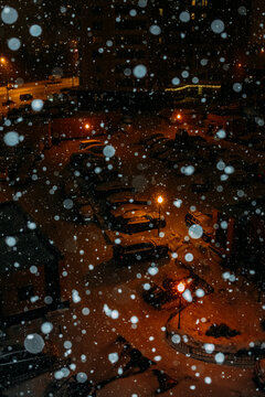 Snowfall in a residential area.