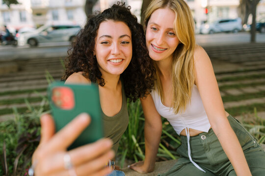 Smiley women taking a selfie