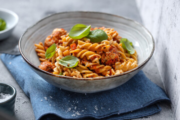 Pasta with tomato sauce served in bowl