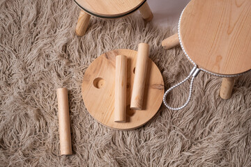 Top View of Three-Legged Chairs Being Put Together