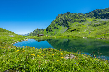 Fototapeta na wymiar Lake in the Hochjoch, in the Montafon Valley, State of Vorarlberg.