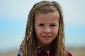 Portrait of a little girl on the beach