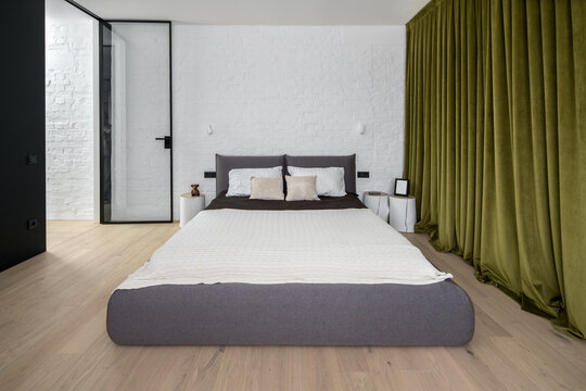 Loft style bedroom with modern light bed