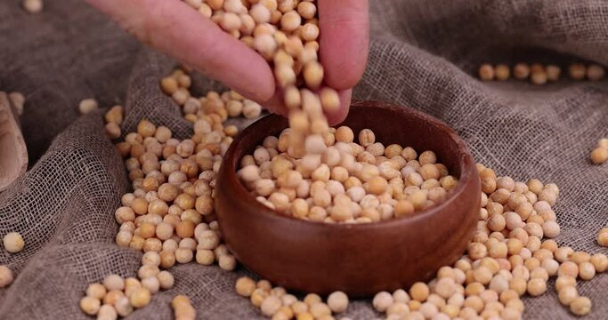 Round yellow peas for cooking porridge, raw yellow peas scattered before cooking