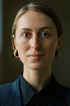 Business woman wearing man classic suite  in closeup