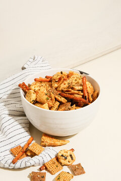 Chex mix snack in bowl on counter top 