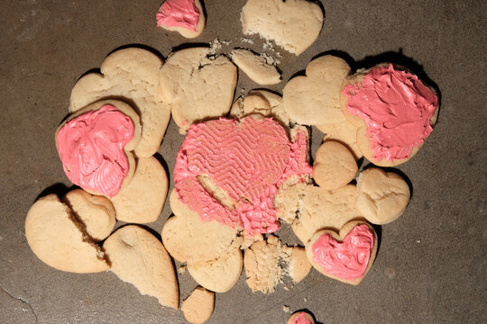 Heart shaped cookies crushed under foot
