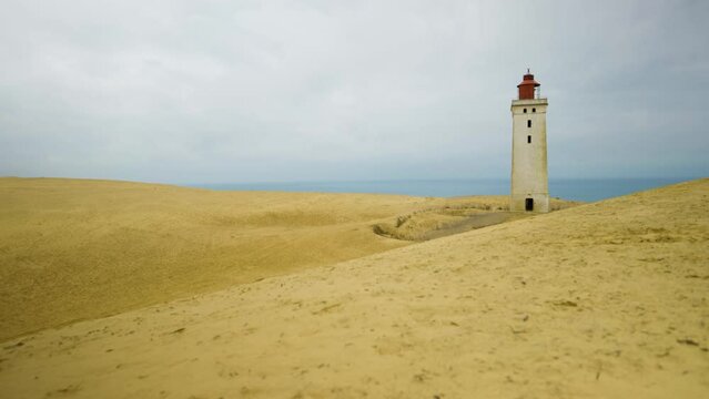 2022 - Clouds pass by the Rubjerg Knude lighthouse on Lonstrup Cliff in Denmark.
