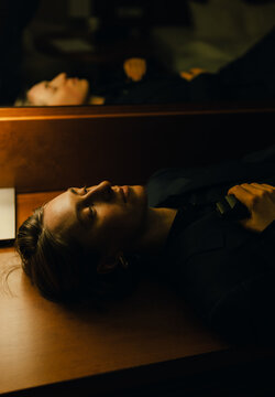 Tired woman wearing man classic suite 