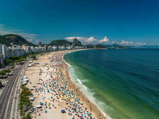 Fototapeta premium Aerial view of Copacabana Beach on sunny summer day. City skyline, Rio de Janeiro, Brazil 