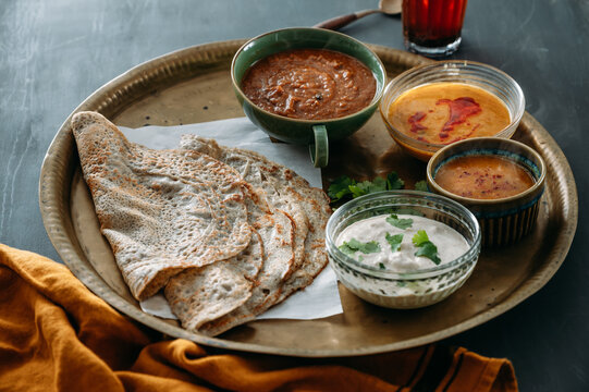 Indian dosas with curries, chutneys, dal