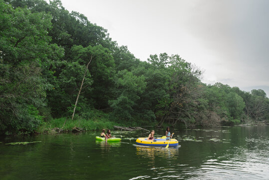 Girls in inflatable rafts