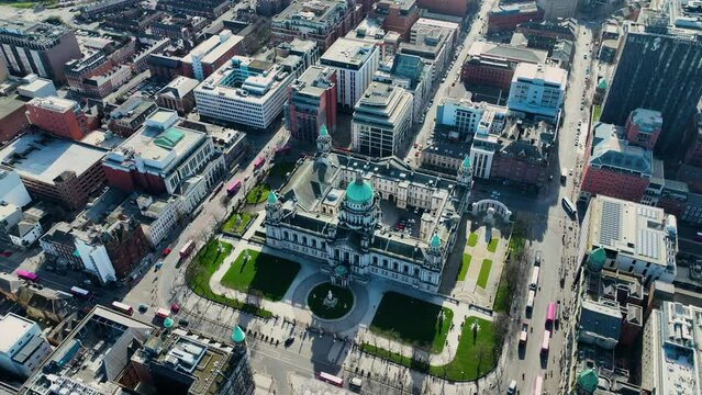 Aerial video of Belfast City Hall Cityscape Slyline on a sunny day in Northern Ireland 