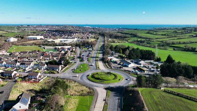 Aerial video of Residential homes and business in Millbrook Larne County Antrim Northern Ireland