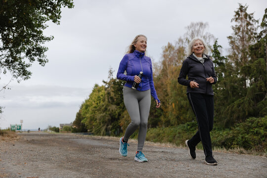 Fitness partners enjoying exercise routine together.