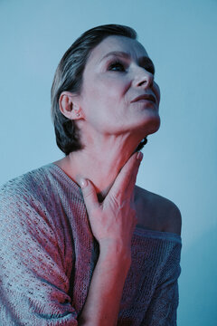 Pensive middle aged woman - color portrait