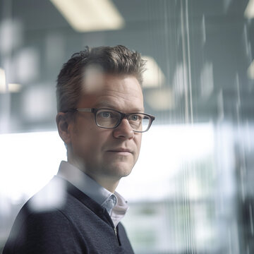 Portrait of a man with glasses and a shirt looking into a business office, generative AI