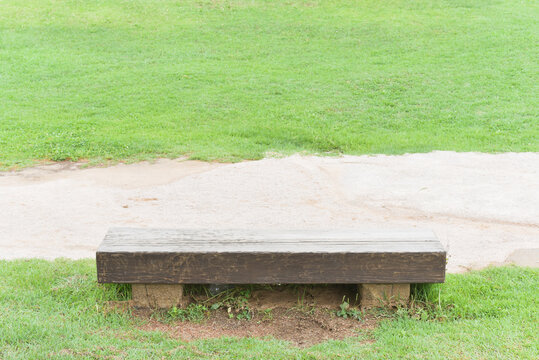 Natural wooden bench in Spring