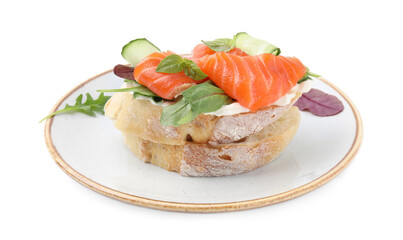 Tasty bruschetta with salmon, cucumbers and herbs on white background