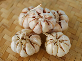 garlic on a woven bamboo