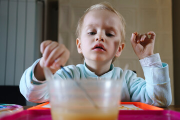 Child paint with watercolors