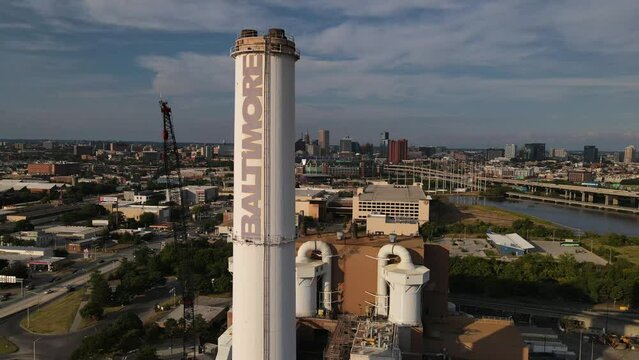 2022 - Excellent aerial footage close-up of the Wheelabrator Incinerator, with the Baltimore, Maryland skyline in the background.